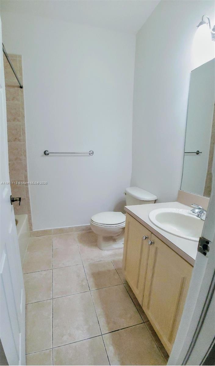 988 Southwest 154th Path Miami, FL 33194 - Photo 19 of 31 a view of a bathroom with a sink and toilet