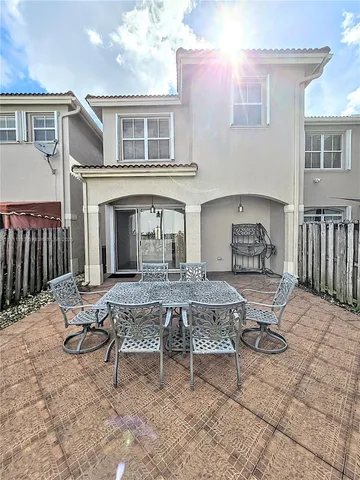 a view of a dinning table and chair in the house