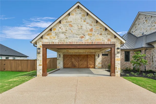 front view of a house with a garden
