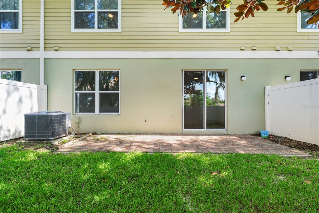4824 Poolside Drive St. Cloud, FL 34769 - Photo 24 of 29 a view of front door of house with yard