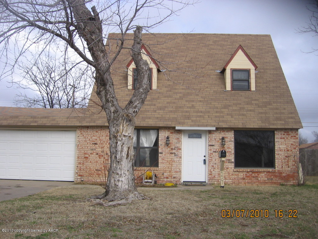 4401 Crockett Street Amarillo, TX 79110 - Photo 1 of 15 a front view of house with yard