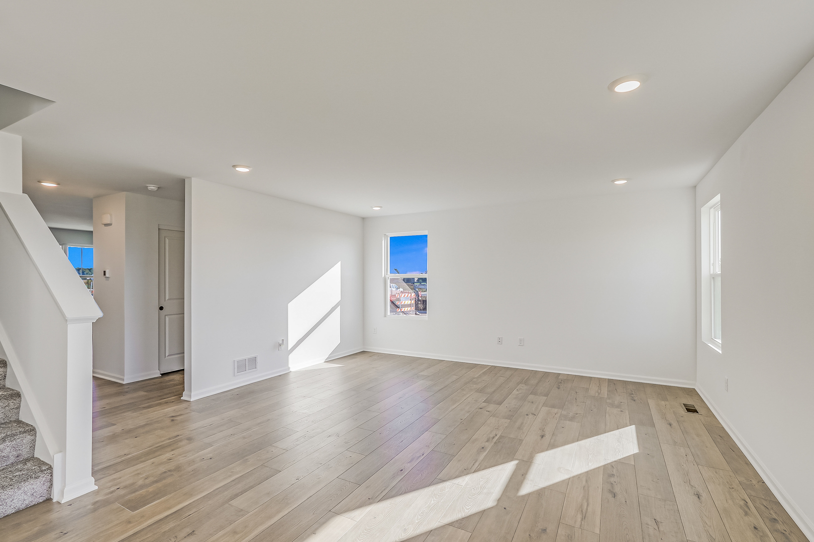 488 Endicott Road South Elgin, IL 60177 - Photo 13 of 30 an empty room with wooden floor and windows