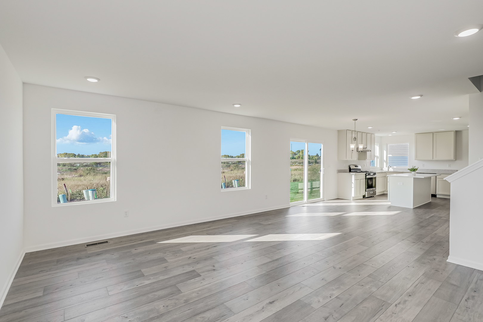 488 Endicott Road South Elgin, IL 60177 - Photo 16 of 30 a view of an empty room with wooden floor and a window