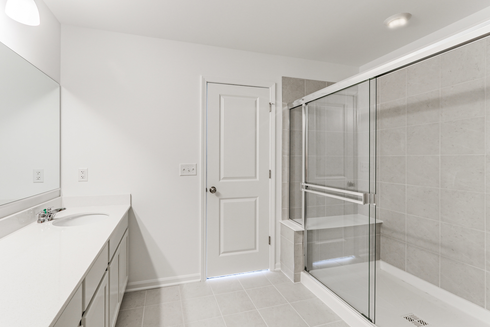 488 Endicott Road South Elgin, IL 60177 - Photo 23 of 30 a bathroom with a shower and a sink