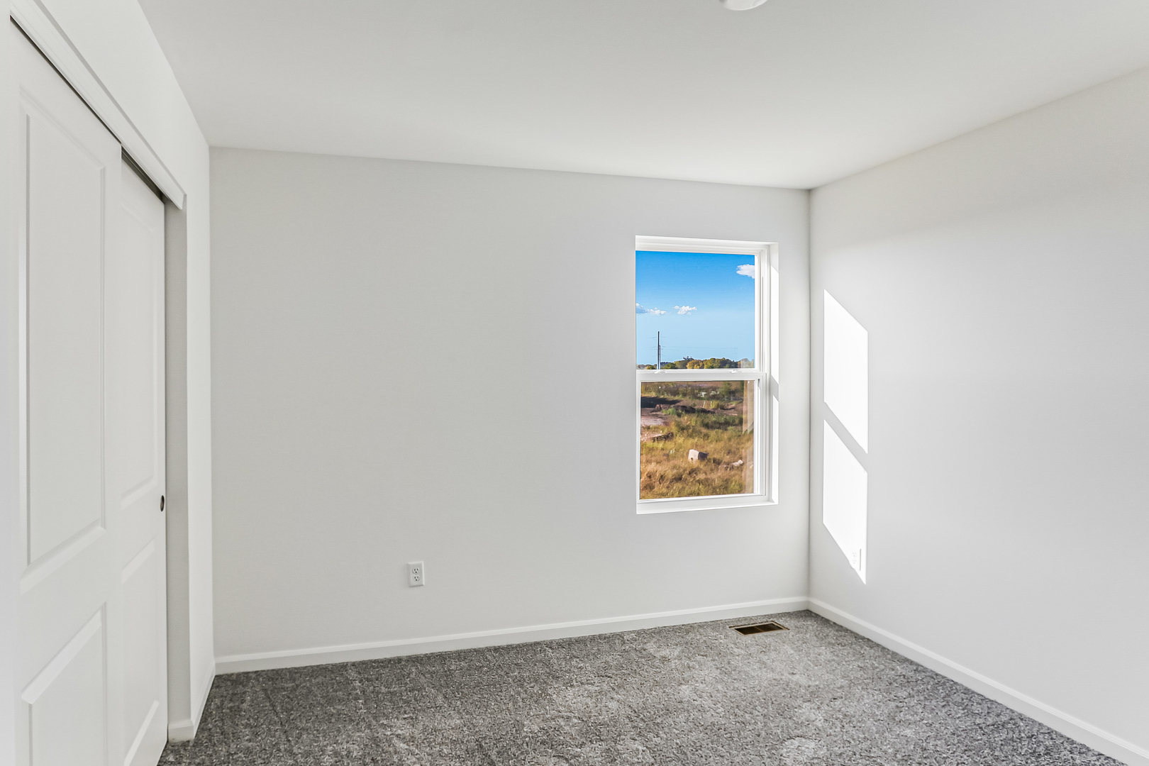 488 Endicott Road South Elgin, IL 60177 - Photo 24 of 30 a view of an empty room and a window