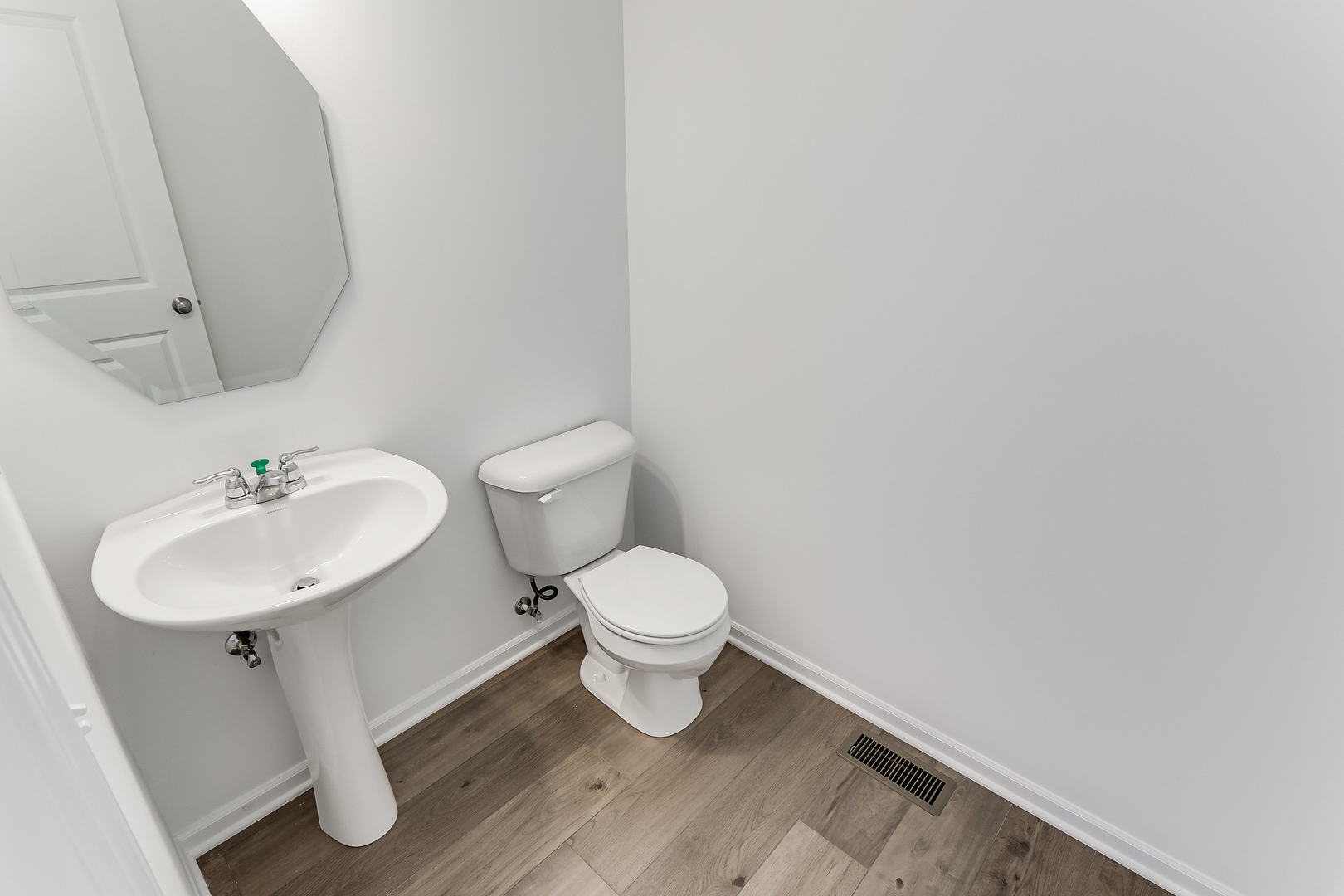 488 Endicott Road South Elgin, IL 60177 - Photo 30 of 30 a white toilet sitting next to a bathroom sink