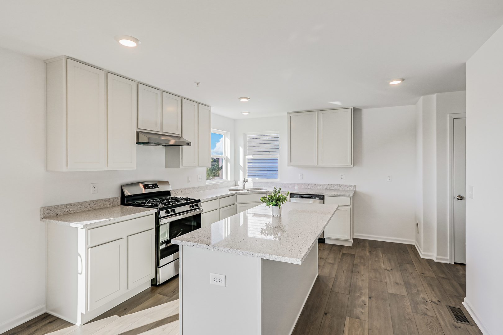 488 Endicott Road South Elgin, IL 60177 - Photo 6 of 30 a kitchen with a stove a sink and a refrigerator