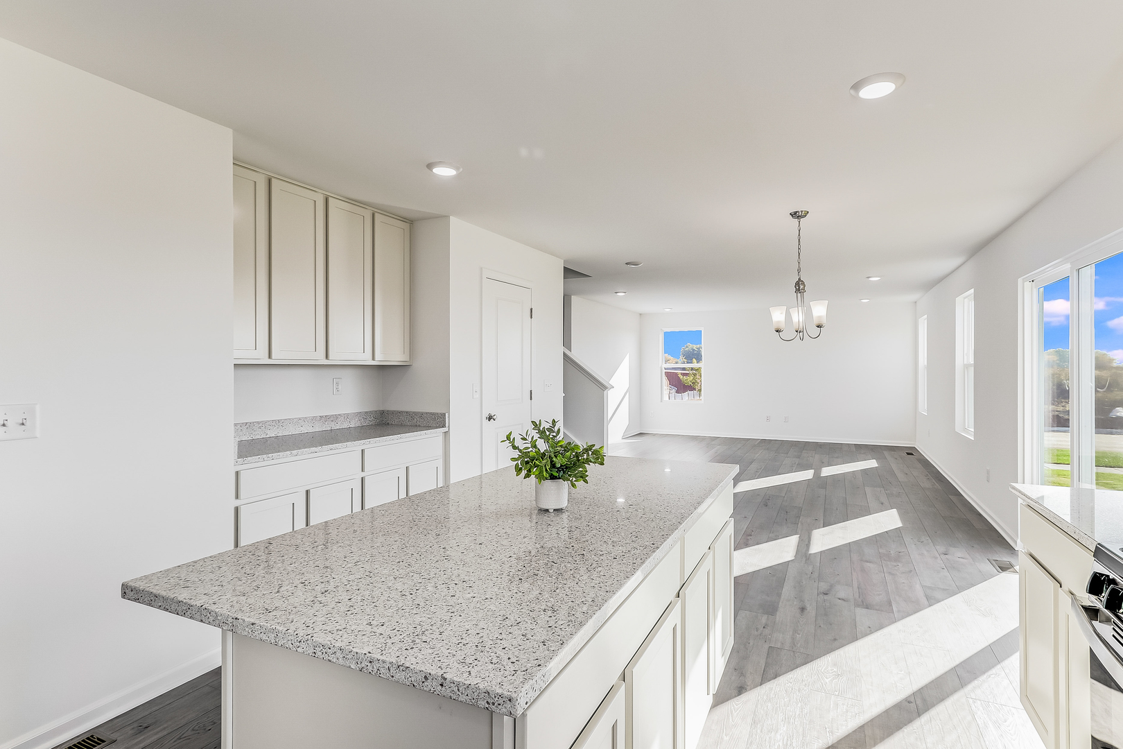 488 Endicott Road South Elgin, IL 60177 - Photo 8 of 30 a kitchen with granite countertop a sink a center island and cabinets