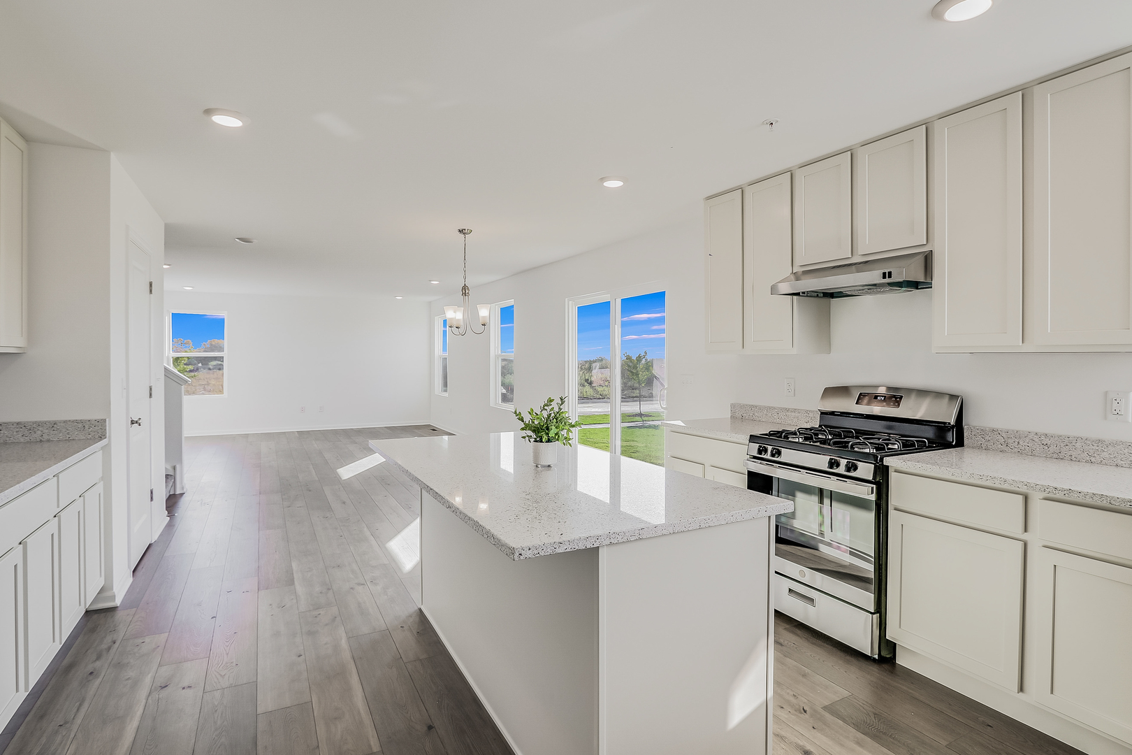 488 Endicott Road South Elgin, IL 60177 - Photo 10 of 30 a kitchen with stainless steel appliances granite countertop a lot of counter space and wooden floor