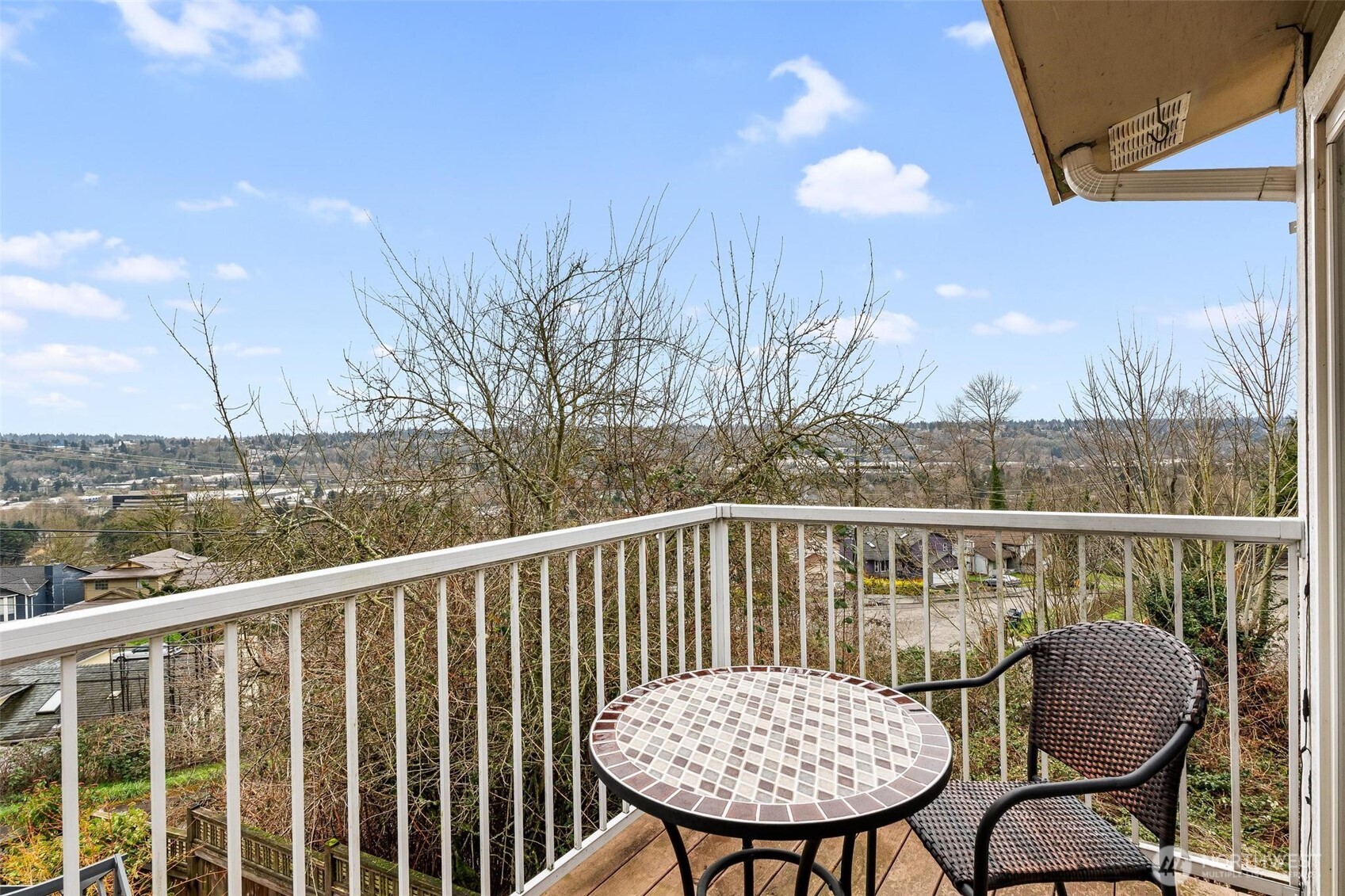 5162 South Wallace Street Seattle, WA 98178 - Photo 11 of 37 a view of a chairs and table on the roof deck