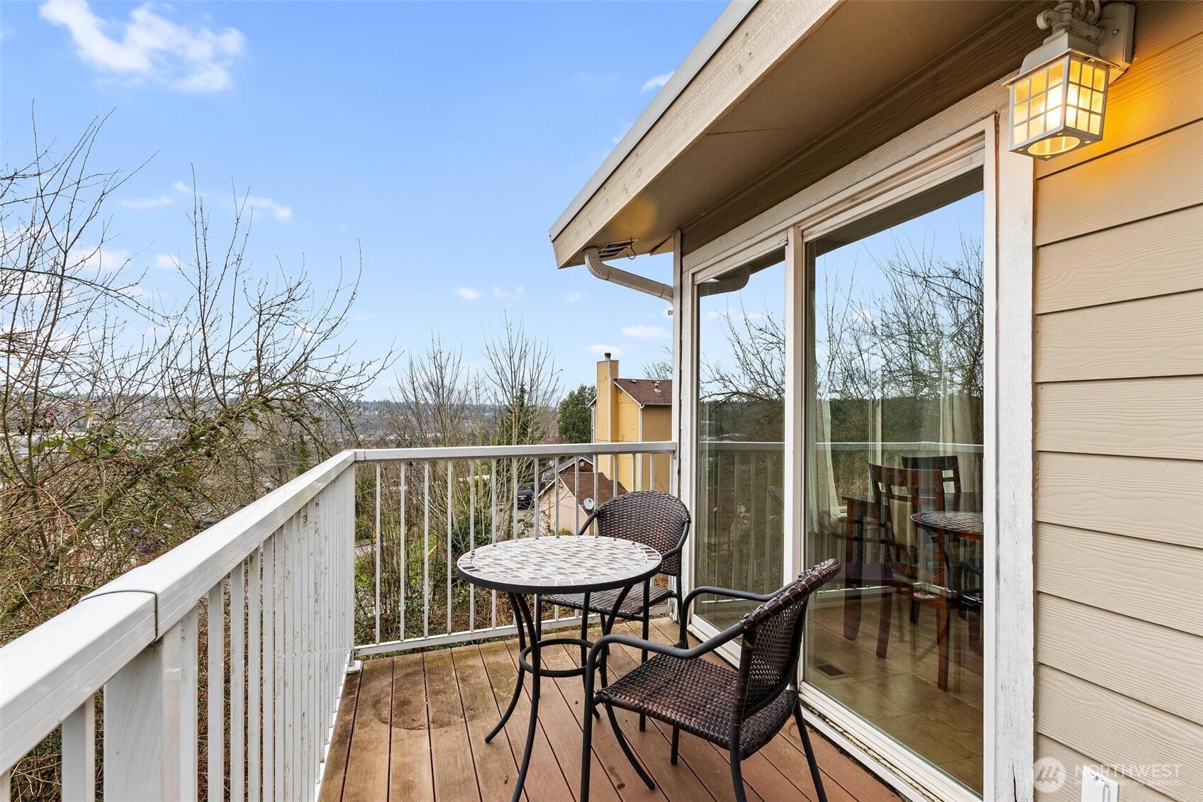 5162 South Wallace Street Seattle, WA 98178 - Photo 12 of 37 a view of a chairs and table in the balcony