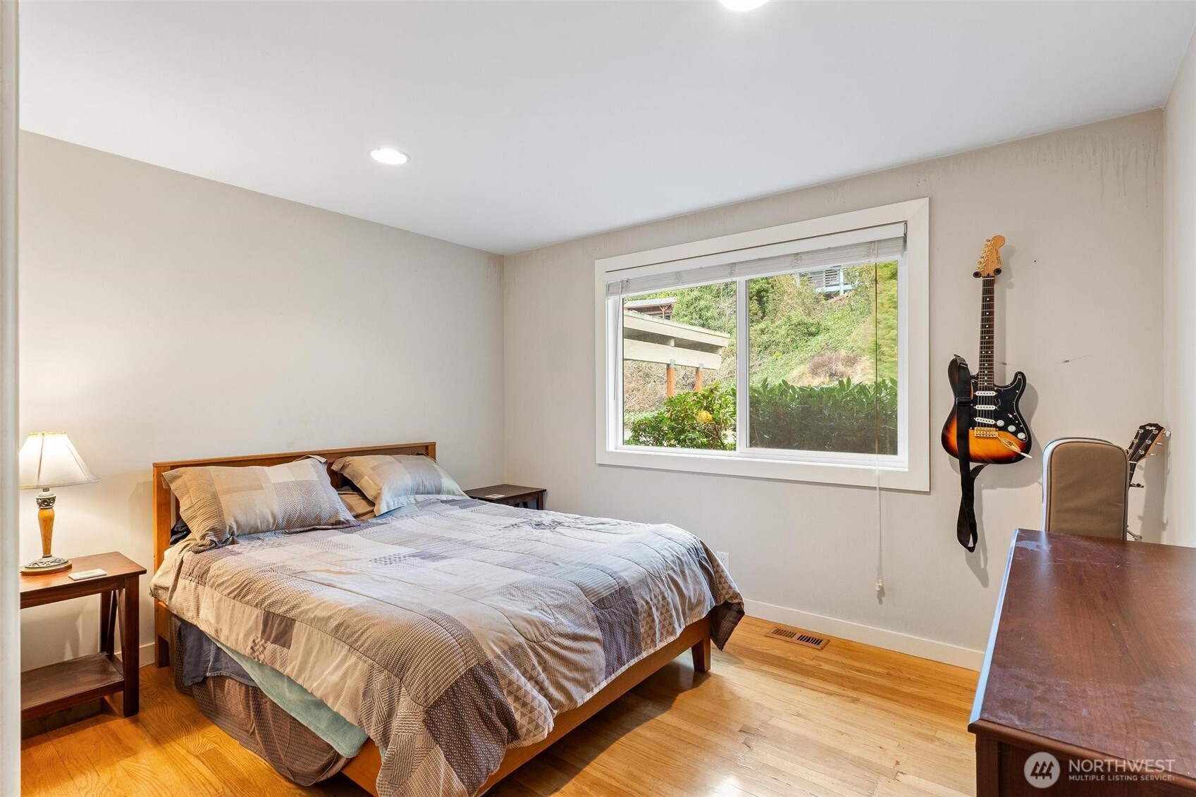 5162 South Wallace Street Seattle, WA 98178 - Photo 13 of 37 a bedroom with a bed and a window