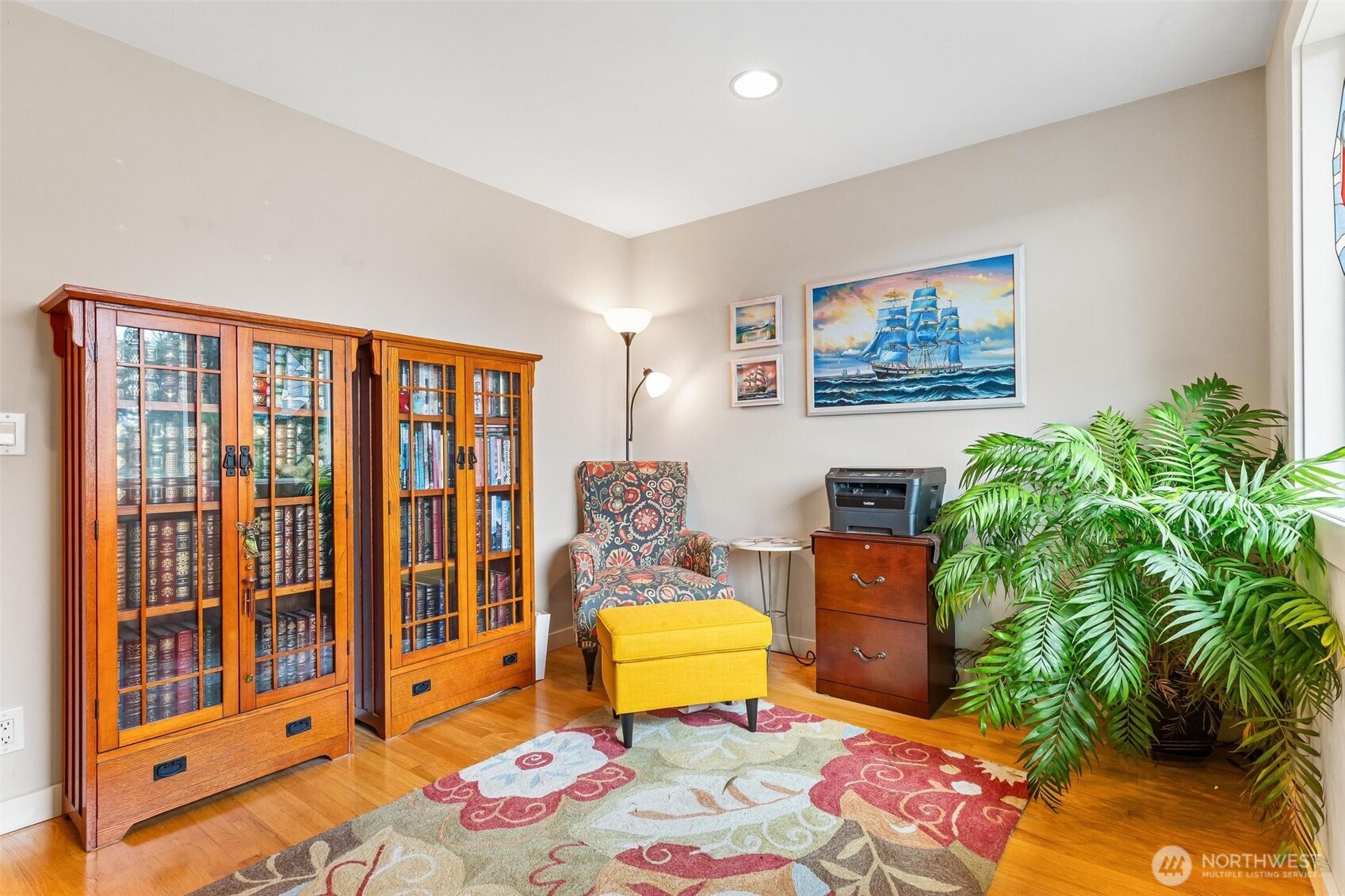 5162 South Wallace Street Seattle, WA 98178 - Photo 14 of 37 a bedroom with furniture and a painting on the wall