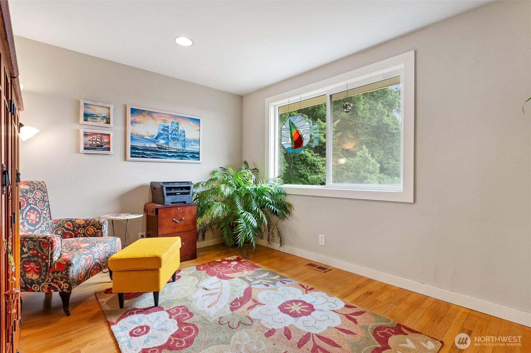 5162 South Wallace Street Seattle, WA 98178 - Photo 15 of 37 a living room with furniture and a potted plant