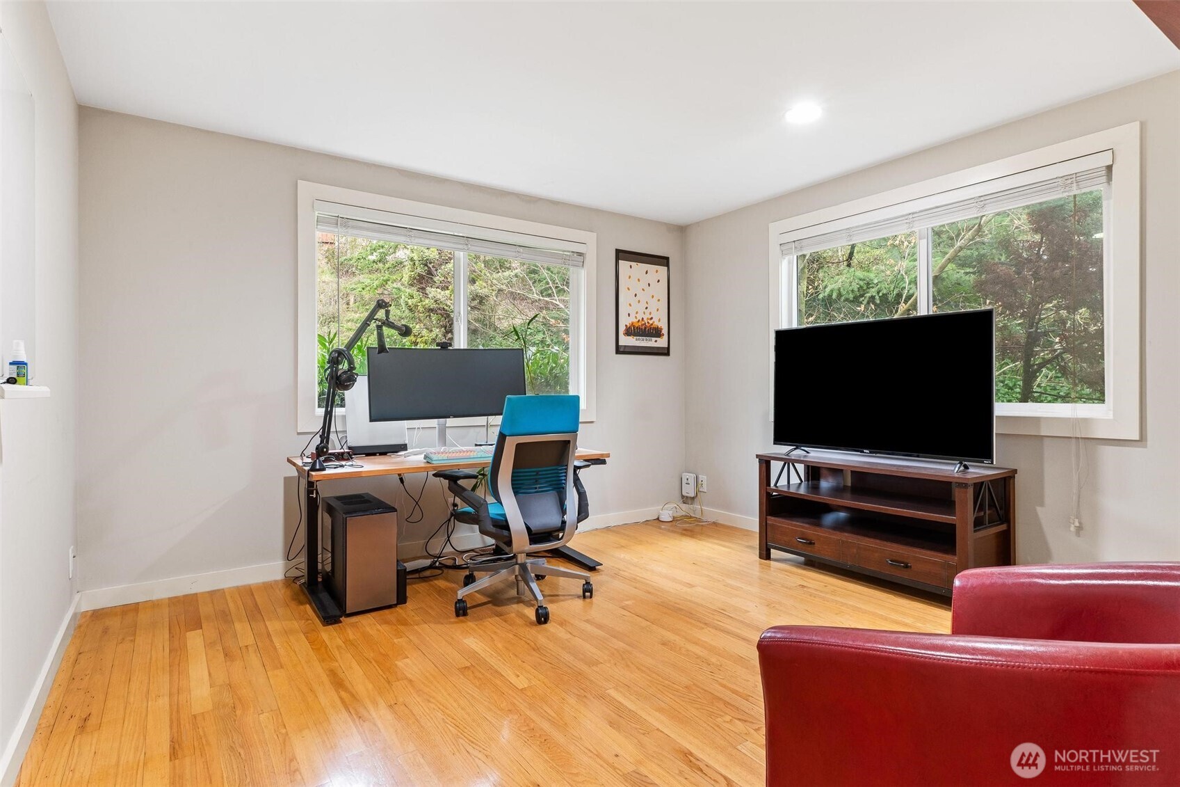 5162 South Wallace Street Seattle, WA 98178 - Photo 16 of 37 a living room with furniture and a flat screen tv