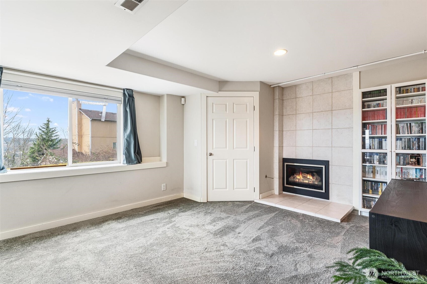5162 South Wallace Street Seattle, WA 98178 - Photo 21 of 37 a view of livingroom with furniture and a fireplace
