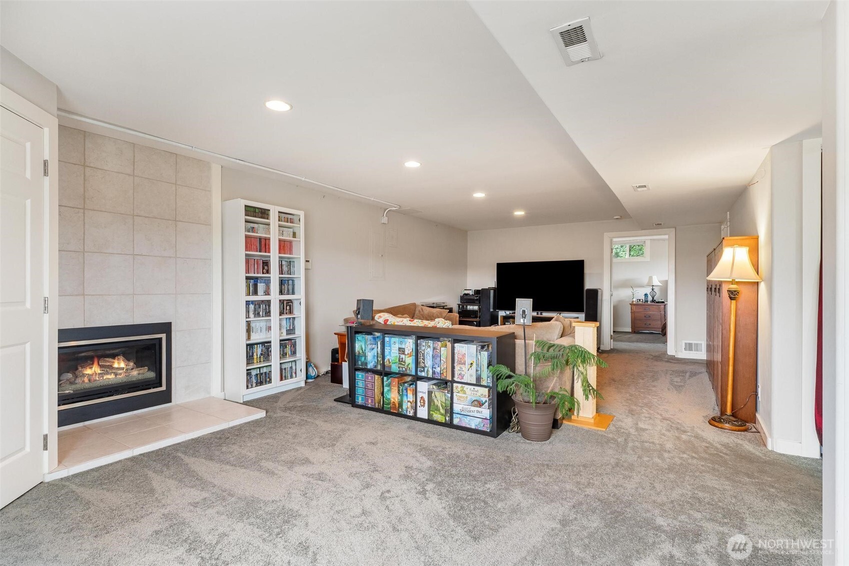 5162 South Wallace Street Seattle, WA 98178 - Photo 22 of 37 a living room with furniture and a fireplace