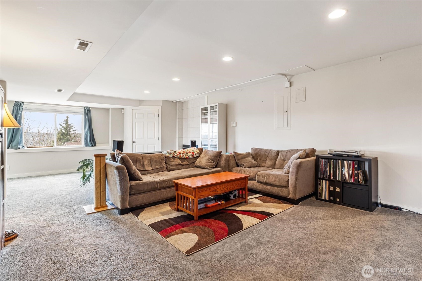 5162 South Wallace Street Seattle, WA 98178 - Photo 23 of 37 a living room with furniture a couch and a window