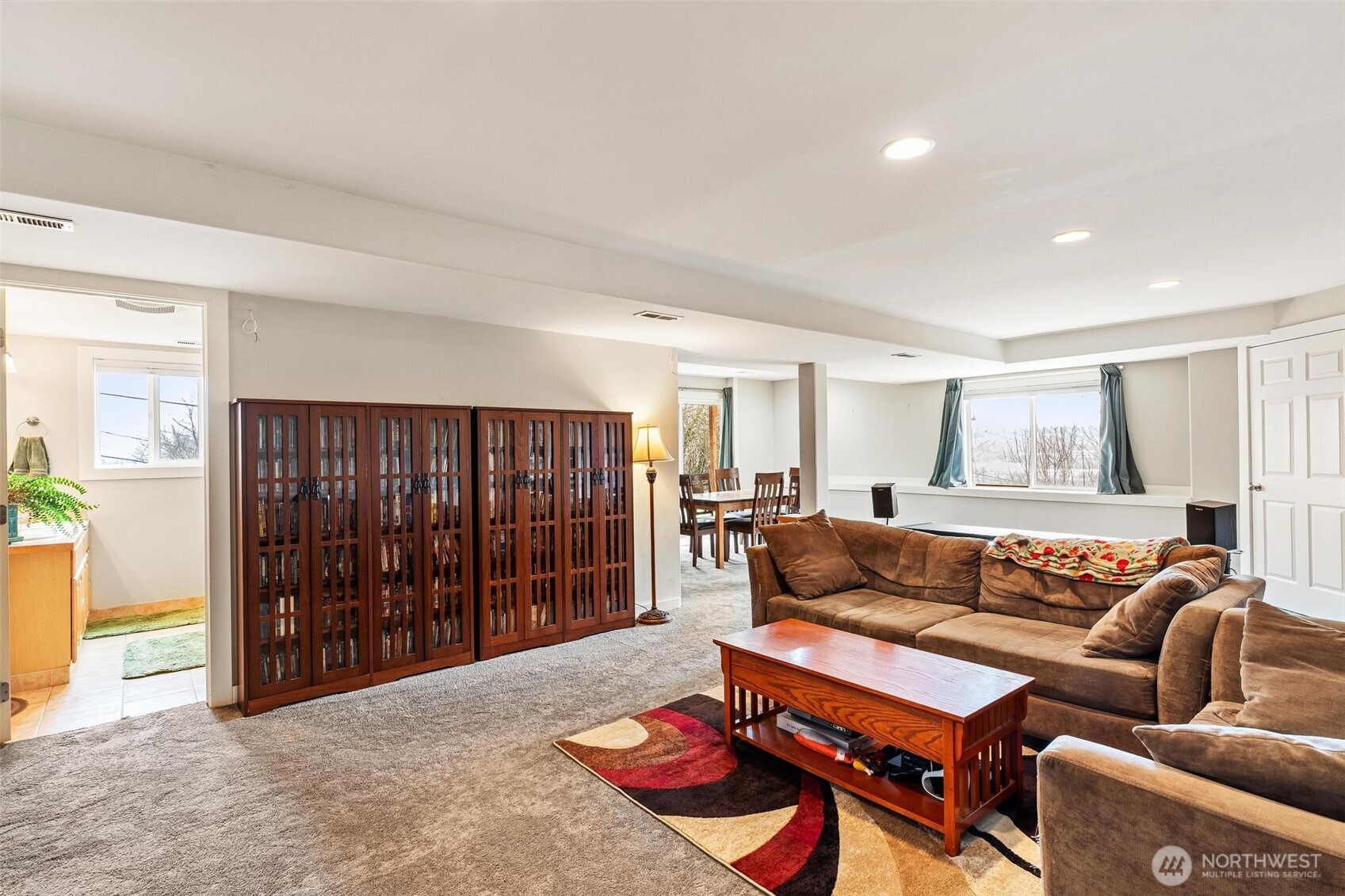 5162 South Wallace Street Seattle, WA 98178 - Photo 25 of 37 a living room with furniture and a window