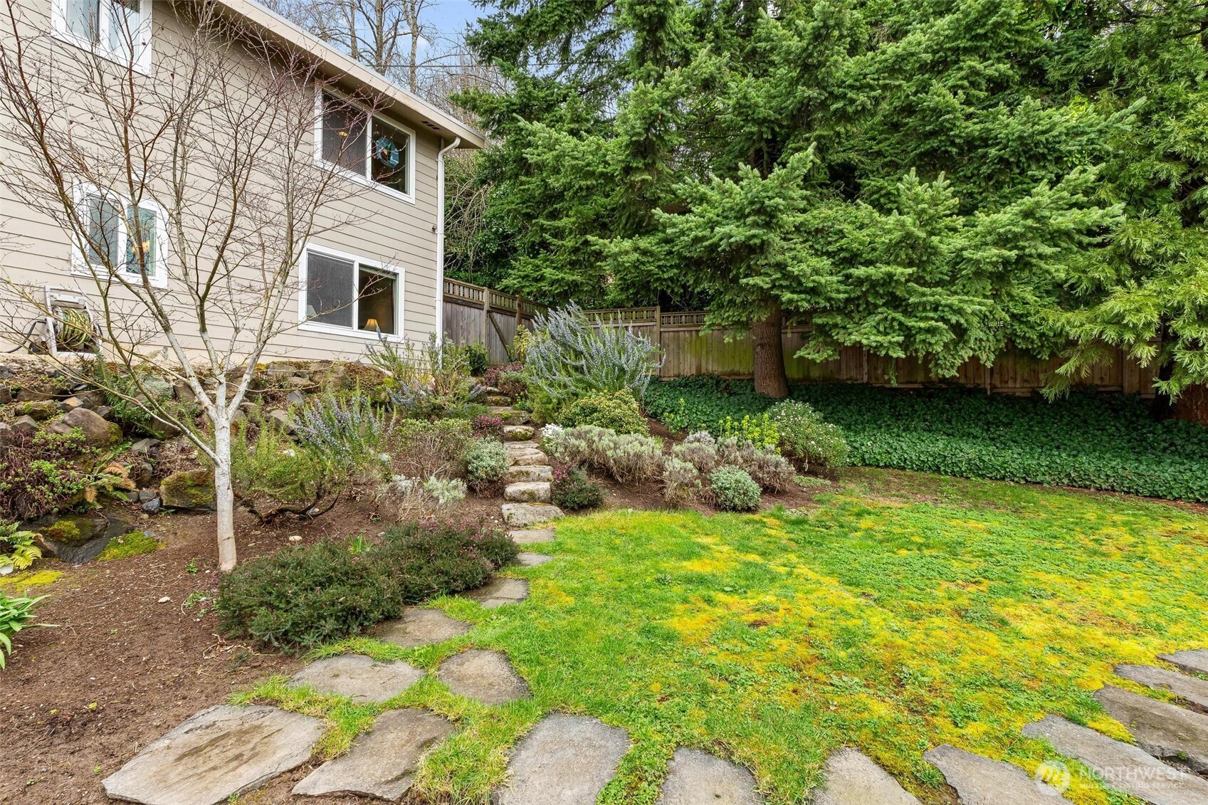 5162 South Wallace Street Seattle, WA 98178 - Photo 31 of 37 a backyard of a house with lots of green space