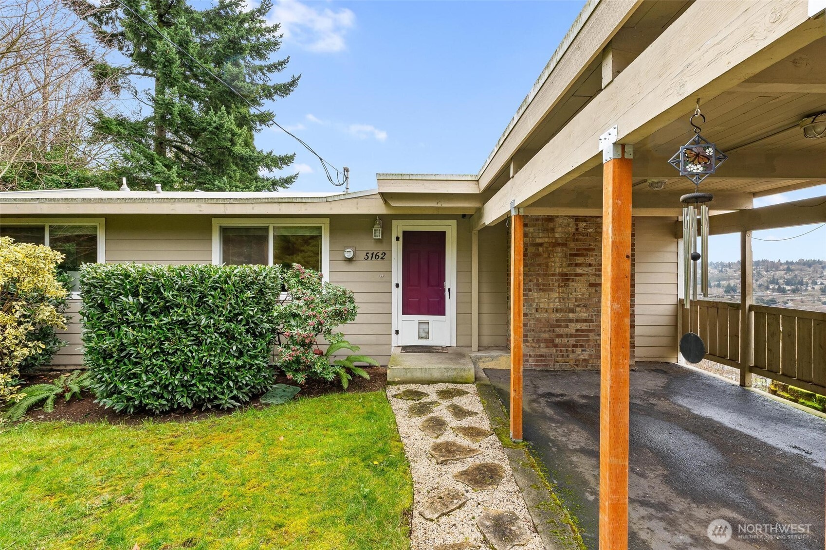 5162 South Wallace Street Seattle, WA 98178 - Photo 35 of 37 front view of house with a yard