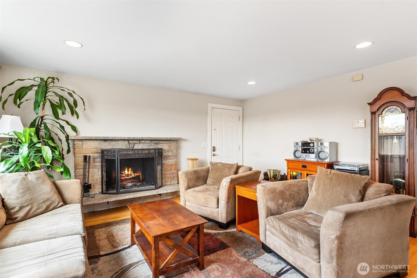 5162 South Wallace Street Seattle, WA 98178 - Photo 5 of 37 a living room with furniture and a fireplace