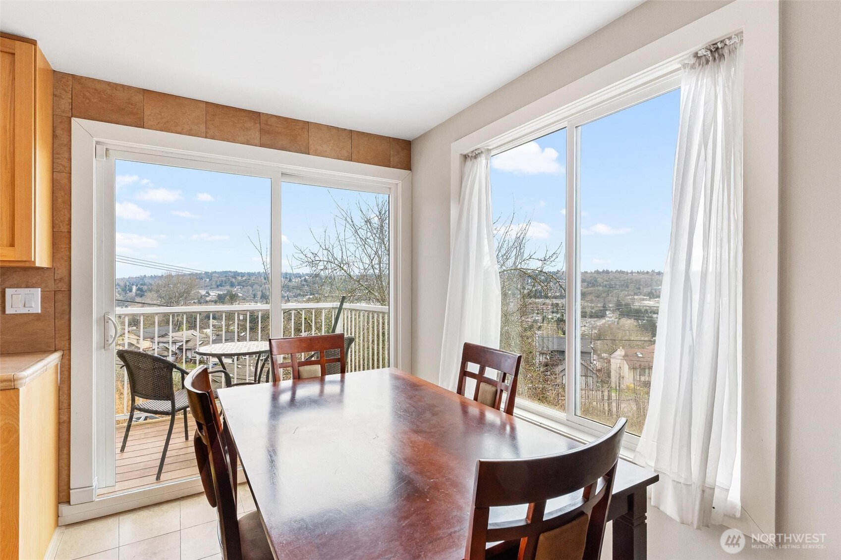 5162 South Wallace Street Seattle, WA 98178 - Photo 9 of 37 a dining room with furniture window and outside view