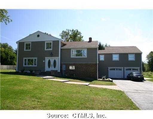 194 Neipsic Road Glastonbury, CT 06033 - Photo 1 of 1 a front view of a house with a yard