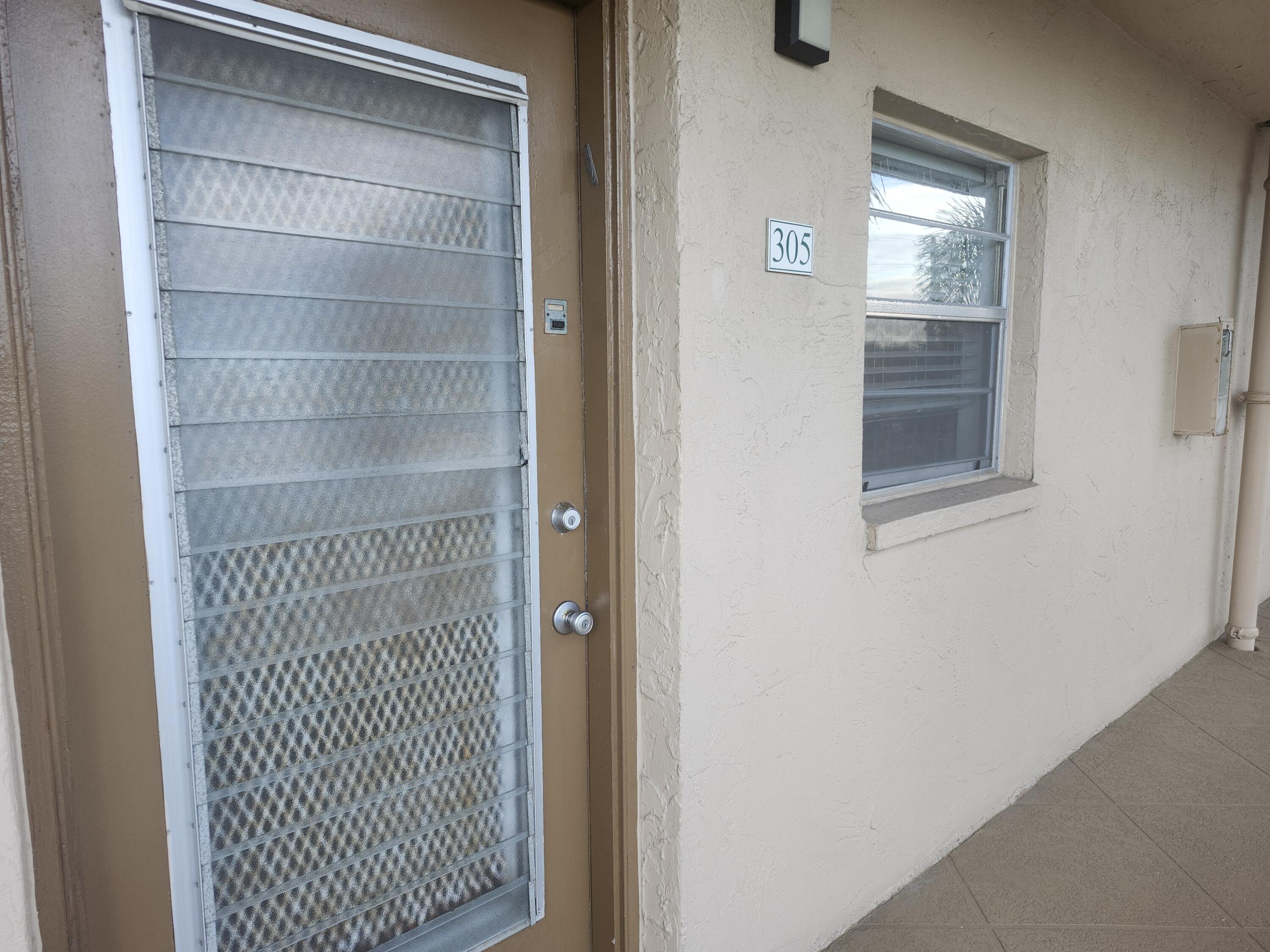300 Northeast 26th Avenue, Unit 305 Boynton Beach, FL 33435 - Photo 24 of 54 a bathroom with a shower