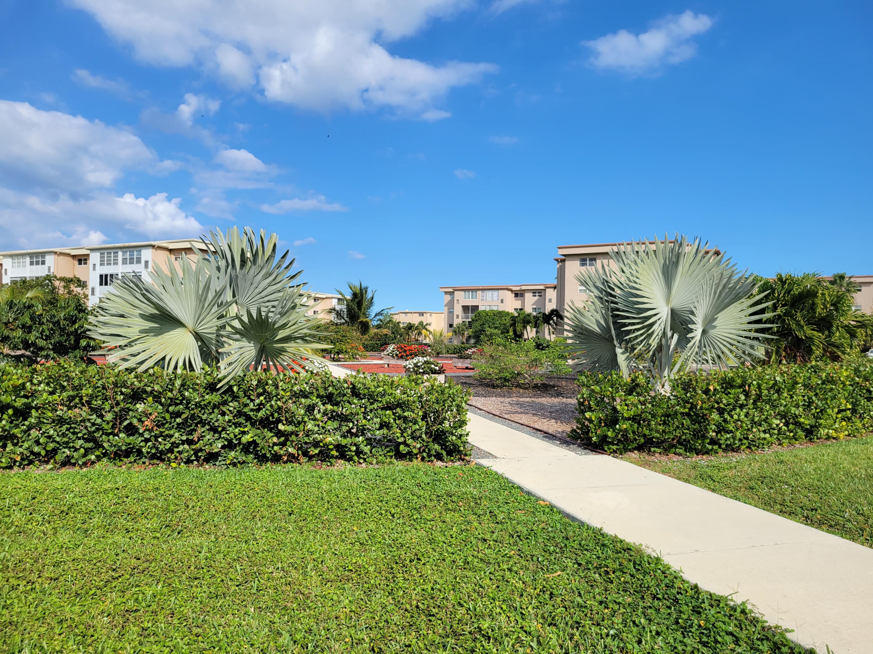 300 Northeast 26th Avenue, Unit 305 Boynton Beach, FL 33435 - Photo 37 of 54 a view of a garden