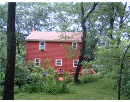 1374 Trapelo Road Waltham, MA 02451 - Photo 2 of 10 a view of a brick house with a yard and large tree