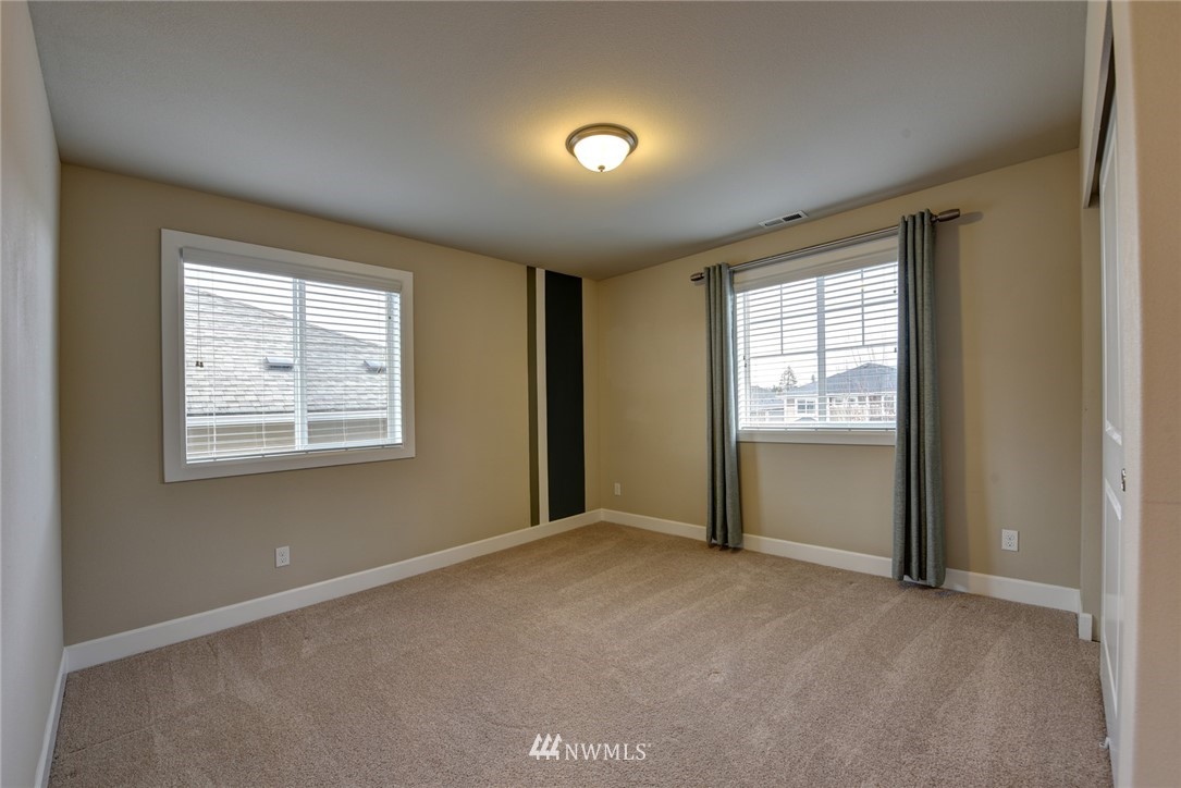 4130 174th Street Southeast Bothell, WA 98012 - Photo 22 of 29 a view of an empty room with a window