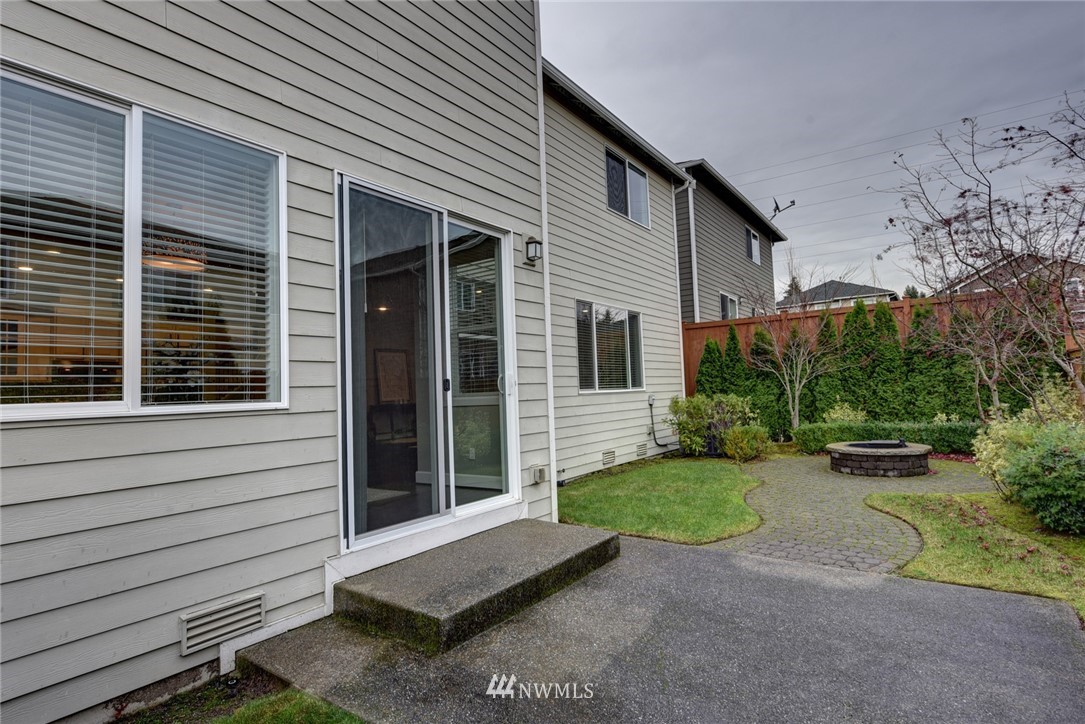 4130 174th Street Southeast Bothell, WA 98012 - Photo 26 of 29 a view of a house with a yard