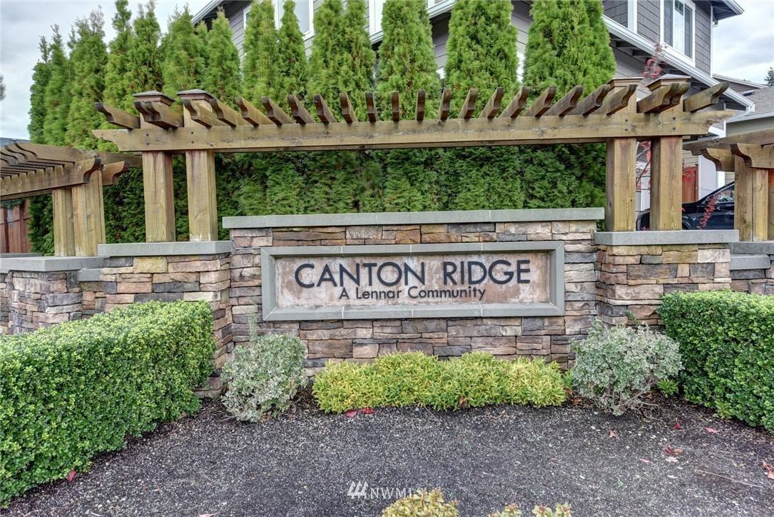 4130 174th Street Southeast Bothell, WA 98012 - Photo 29 of 29 a sign on the side of a building