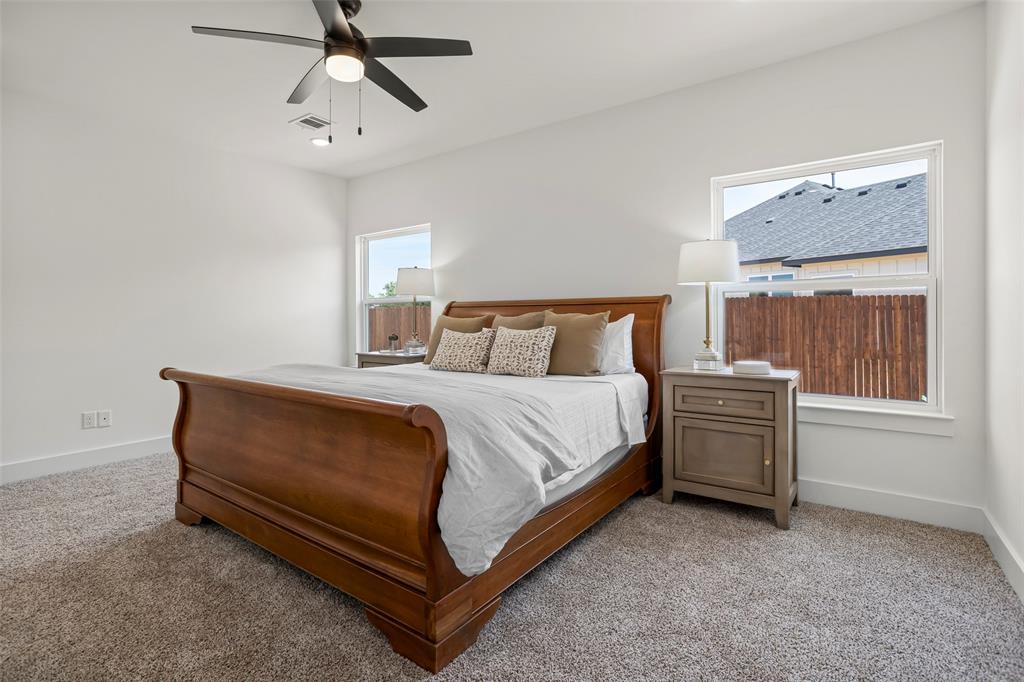 204 Cliff Court Godley, TX 76044 - Photo 15 of 27 a bedroom with a bed and window