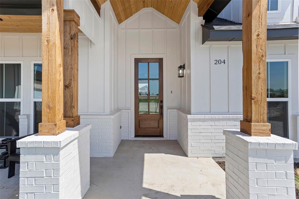 204 Cliff Court Godley, TX 76044 - Photo 2 of 27 a view of an entryway of house