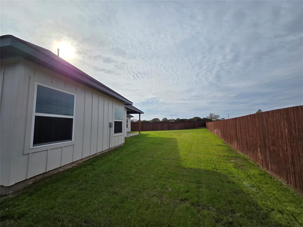 204 Cliff Court Godley, TX 76044 - Photo 26 of 27 a view of back yard of the house
