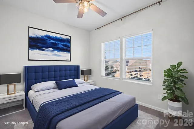 a storage room with wooden floor washer and dryer