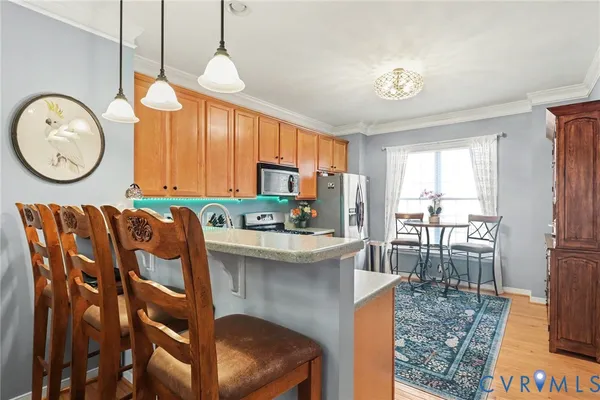 a room with a table and chairs