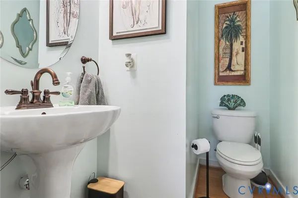 a view of a balcony with a table and chairs