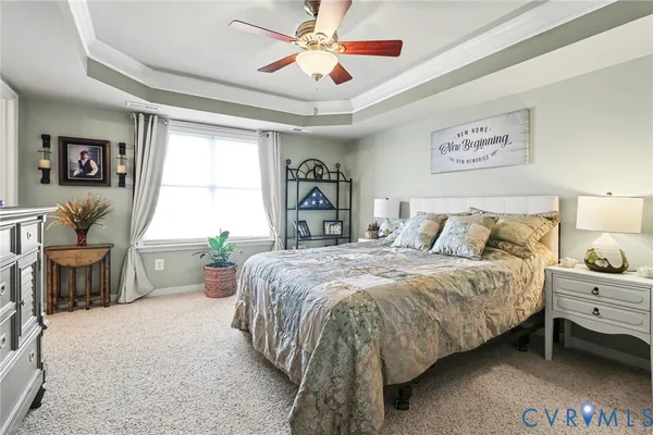 a bedroom with a bed and a walk in closet