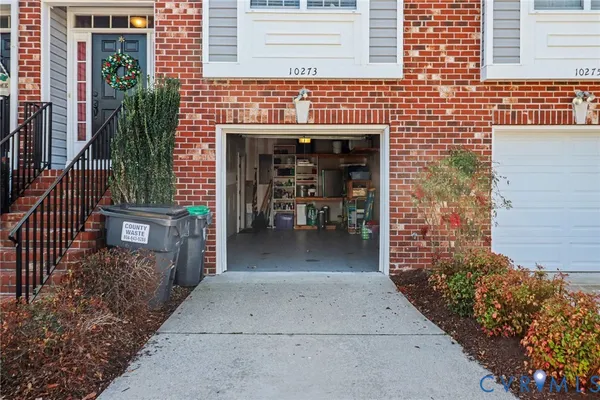 a picture of a bench in front of a wall