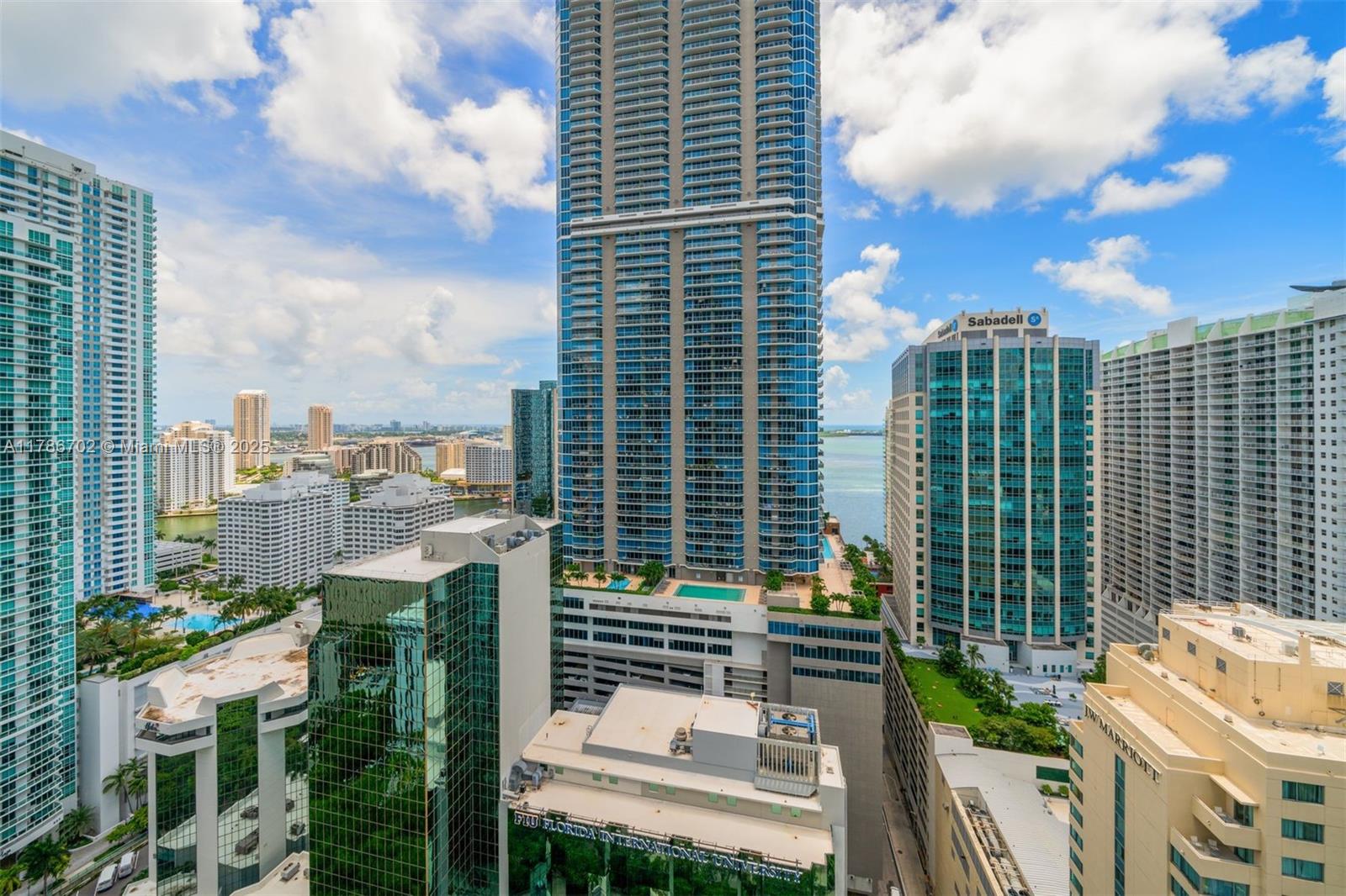 1060 Brickell Avenue, Unit 3003 Miami, FL 33131 - Photo 24 of 39 a view of a city with tall buildings
