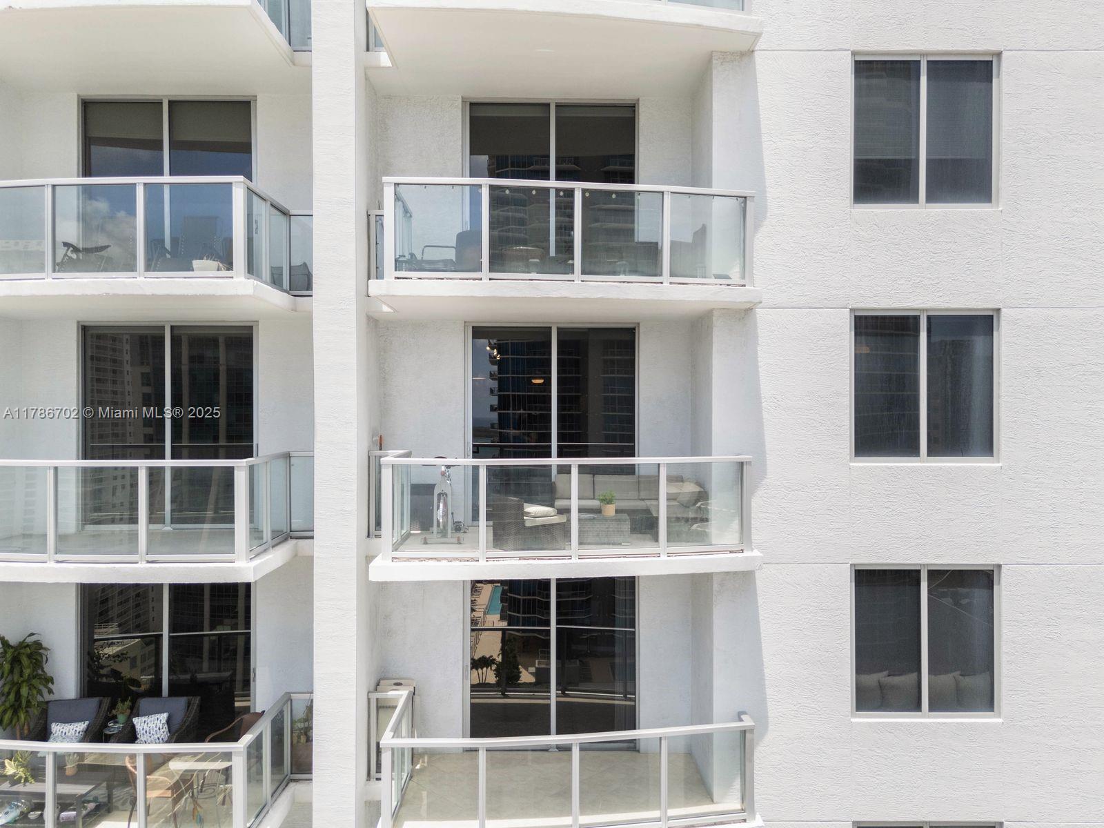 1060 Brickell Avenue, Unit 3003 Miami, FL 33131 - Photo 30 of 39 a view of front a house with a window