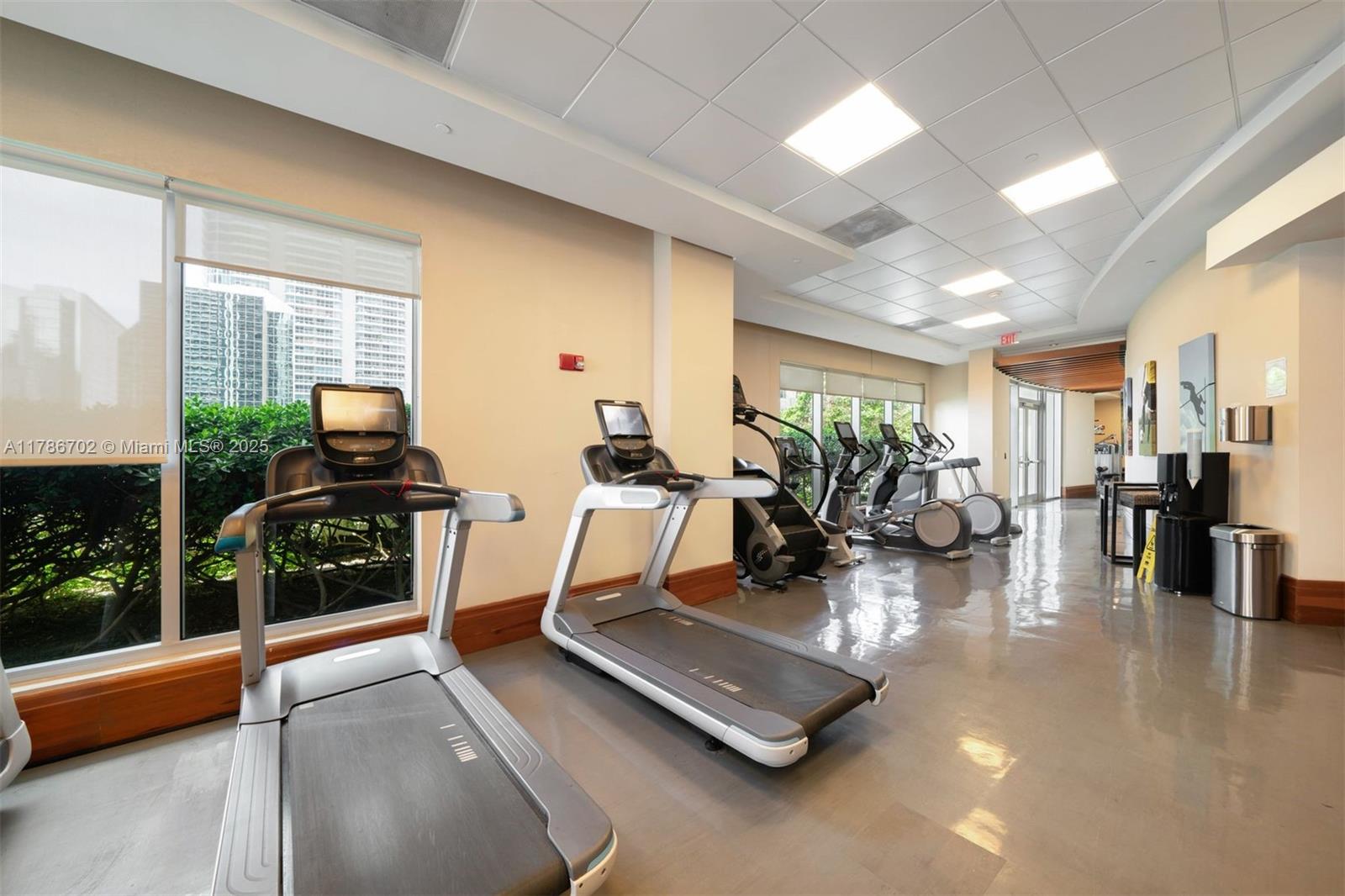 1060 Brickell Avenue, Unit 3003 Miami, FL 33131 - Photo 36 of 39 a view of a gym with lots of counter top space