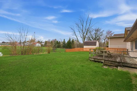 a view of a backyard with a garden