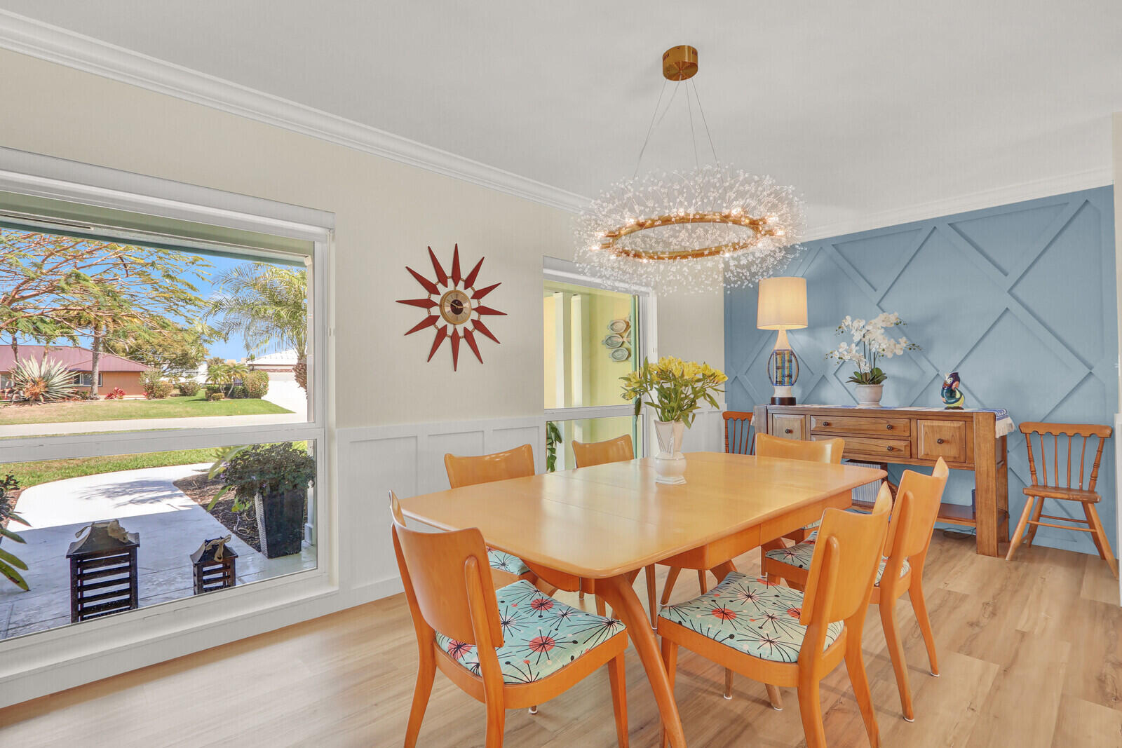 225 Orange Tree Drive Atlantis, FL 33462 - Photo 8 of 44 Dining room with a Feature Wall