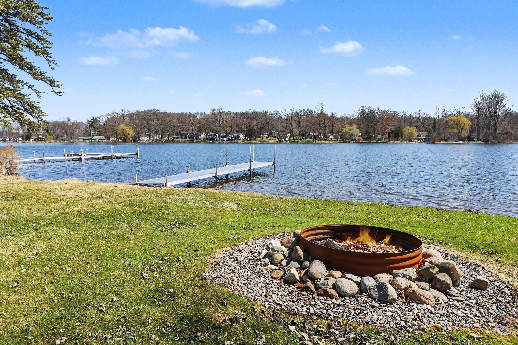 2743 Hemlock Road Quincy, MI 49082 - Photo 26 of 28 View of water and firepit