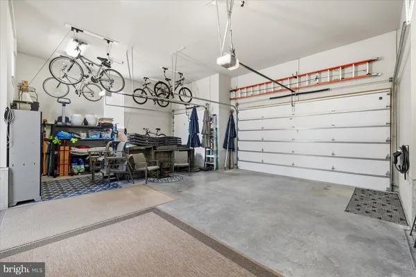 a bedroom with bed and cupboard