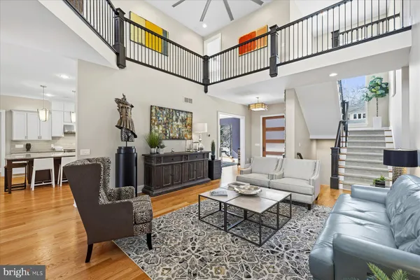 a bedroom with a bed and windows